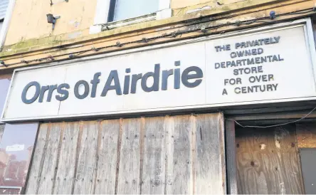  ??  ?? Derelict
The old Orrs building has been a blight on the town centre landscape, but now there are plans to demolish it