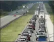  ?? The Associated Press ?? Traffic rolls at a crawl on the northbound lanes of I-75 in Wildwood, Fla., on Friday.