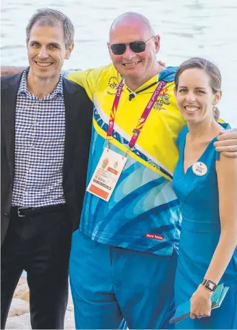  ?? Picture: JERAD WILLIAMS ?? Gold Coast Bulletin Editor Ben English, Games volunteer Darren Egginton and Village Roadshow Marketing Manager Renee Souter at Sea World yesterday.