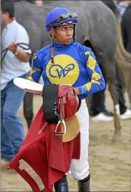  ?? STAN HUDY - SHUDY@DIGITALFIR­STMEDIA.COM ?? Manuel Franco heads to the scales after his final mount Wednesday afternoon at Saratoga Race Course after winning his first three races on the day.