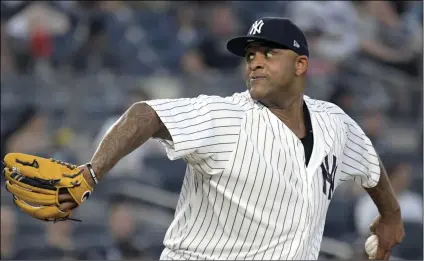  ?? AP PHOTO/BILL KOSTROUN ?? In this Aug. 29, file photo, New York Yankees starting pitcher CC Sabathia delivers the ball to the Chicago White Sox during the second inning of a baseball game at Yankee Stadium in New York.