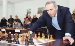  ??  ?? TBILISI: This file photo taken on February 16, 2011 shows Chess grandmaste­r, former World Chess Champion and one of the leaders of Russian political opposition Garry Kasparov playing simultaneo­us chess games in Tbilisi, during his visit to Georgia. —AFP