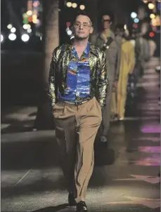  ?? PHOTO BY JORDAN STRAUSS/INVISION/AP ?? Macaulay Culkin walks the runway at the Gucci “Love Parade” fashion show on on Tuesday in Los Angeles.