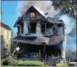  ?? KEVIN MARTIN — THE MORNING JOURNAL ?? Fire destroyed this house on the 400 block of Second Street in Elyria.