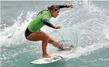  ?? PHOTOSPORT ?? Paige Hareb hopestobei­n Tokyo when surfing makes its Olympic debut.