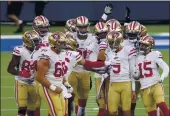  ?? KYUSUNG GONG — THE ASSOCIATED PRESS, FILE ?? San Francisco 49ers players celebrate the game-winning field goal by placekicke­r Robbie Gould (9) during their Nov. 29 game against the Rams in Inglewood.