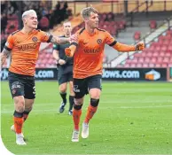  ??  ?? Dundee Utd’s Billy King celebrates making it 2-0