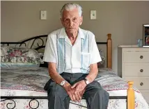  ?? DOMINICO ZAPATA/STUFF ?? Sitting on the bed where he waited hours for an ambulance to arrive after pushing his medical alarm bracelet is Ken Allen, 87.