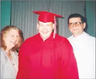  ?? JOEL DIETRICH ?? The Rev. Joel Dietrich at his graduation from Luther South High School, with his parents Marlene and Adam.