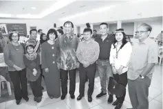  ??  ?? Baru (fifth left) together with his wifeYu Ching Sieu (sixth left) welcoming guests at their open house yesterday. Also seen are See (third right) and Ali Biju (fourth right).