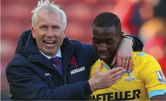  ??  ?? Happy days: Pardew is getting the best out of stars such as winger Yannick Bolasie (right), helping the Eagles fly well clear of the drop zone