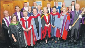  ??  ?? Senior academic staff and special guests from this year’s graduation. SAMS UHI’s Dr David Hughes had the honour of carrying the ceremonial mace.