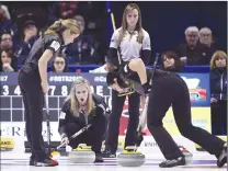  ?? Canadian Press photo ?? Skip Jennifer Jones of Winnipeg, Man., shouts to second Jill Officer as third Kaitlyn Lawes, left, and skip Rachel Homan of Ottawa, left, look on during the women's semifinal draw at the 2017 Roar of the Rings Canadian Olympic Trials in Ottawa on Dec. 9.