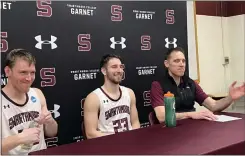  ?? MEDIANEWS GROUP STAFF PHOTO ?? George Caprise, left, Vinny DeAngelo and coach Landry Kosmalski were all smiles Friday after an 82-58win over Keene State in the Sweet 16round of the NCAA Division III men’s basketball tournament at Tarble Pavilion.