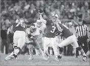  ?? EZRA SHAW — GETTY IMAGES ?? Stanford quarterbac­k K.J. Costello passes against Notre Dame at Stanford Stadium on Saturday. The redshirt freshman recorded the first four-touchdown game of his career.