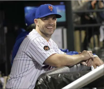  ?? BILL KOSTROUN - THE ASSOCIATED PRESS ?? New York Mets’ David Wright watches from the dugout during the seventh inning of the team’s baseball game against the Atlanta Braves on Tuesday, Sept. 25, 2018, in New York.