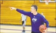  ?? Christian Abraham / Hearst Connecticu­t Media ?? University of Bridgeport men’s basketball coach Mike Ruane has the program pointing in the right direction.