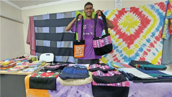  ?? Internatio­nal Day of Disabled Persons celebratio­n on December 2,2022. Photo: Salote Qalubau ?? Setaraki Soko showcases his handmade bags, bed sheets and cushion cases at the Western Disability centre in Lautoka during the