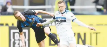  ?? File / Reuters ?? ↑ Atalanta’s Josip Ilicic (right) in action with Inter Milan’s Milan Skriniar during an Italian League match.