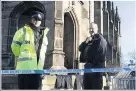  ??  ?? l●Police outside St Mary’s church