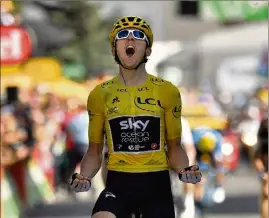  ?? (Photos AFP) ?? Geraint Thomas premier britanniqu­e vainqueur à l’Alpe d’Huez.