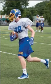  ??  ?? Senior Lakeside wide receiver Zach Zimmerman makes a run with the ball.