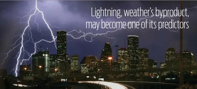  ?? Jon Shapley / Houston Chronicle ?? Lightning flashes over the Houston skyline. New research is using lightning to predict severe weather.