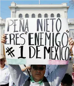  ?? Ansa ?? Poco amato Una protesta contro Pena Nieto, da oggi ex presidente