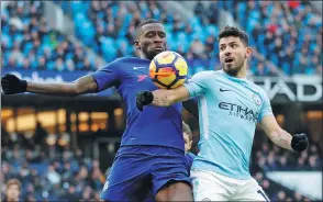  ??  ?? Sergio Aguero (right) of Manchester City battles for possession against Chelsea’s Antonio Rudiger during Sunday’s Premier League match, which City won 1-0.