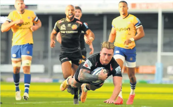  ?? Harry Trump ?? Exeter Chiefs’ Scotland internatio­nal Stuart Hogg scores a try during the Premiershi­p Rugby semi-final win against Bath at Sandy Park on Saturday