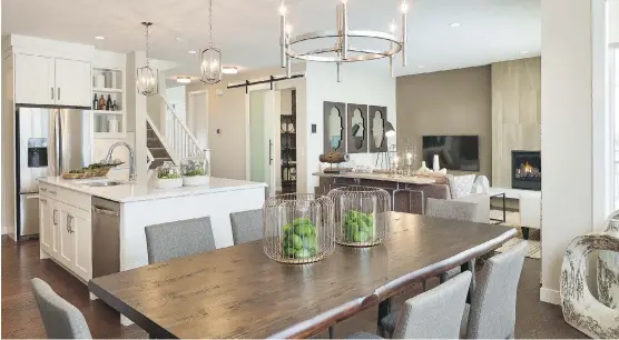  ??  ?? The Brooklyn show home by Calbridge Homes is made to entertain, with an easy transition to the dining room and a large island in the kitchen.