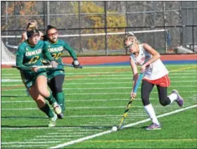  ?? THOMAS NASH - DIGITAL FIRST MEDIA ?? Owen J. Roberts’ Julia Lamb (2) carries it upfield while a pair of Emmaus defenders give chase during Saturday’s game.