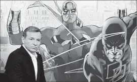  ?? SethWenig ?? IGER’S $4-billion deal to acquire Marvel Entertainm­ent has helped turbocharg­e Walt Disney Studios with blockbuste­r franchises, including “Iron Man.”