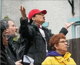  ?? TRENTONIAN FILE PHOTO ?? Rev. Karen Hernandez-Granzen leads the crowd in prayer and song at Sunday’s Unity Walk in Trenton.