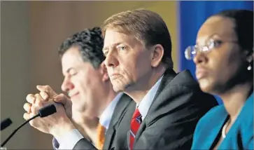  ?? Steve Helber Associated Press ?? A HANDFUL of credit repair companies were accused by the Consumer Financial Protection Bureau of violations from 2009 to 2014 including charging for services in advance. Above, bureau Director Richard Cordray.