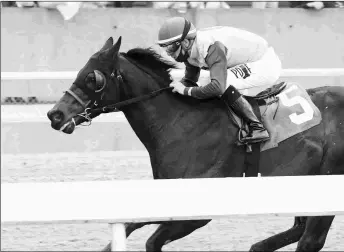  ?? COADY PHOTOGRAPH­Y ?? Tempt Fate wins a six-furlong allowance for Arkansas-breds by 2 1/2 lengths on March 12 at Oaklawn Park.