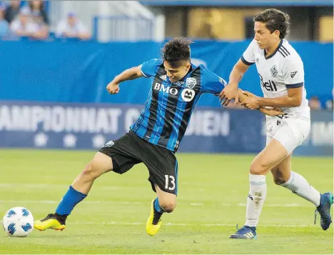  ?? PETER MCCABE/THE CANADIAN PRESS ?? David Norman Jr., right, is hoping to earn his spot in the Vancouver Whitecaps lineup this MLS season.