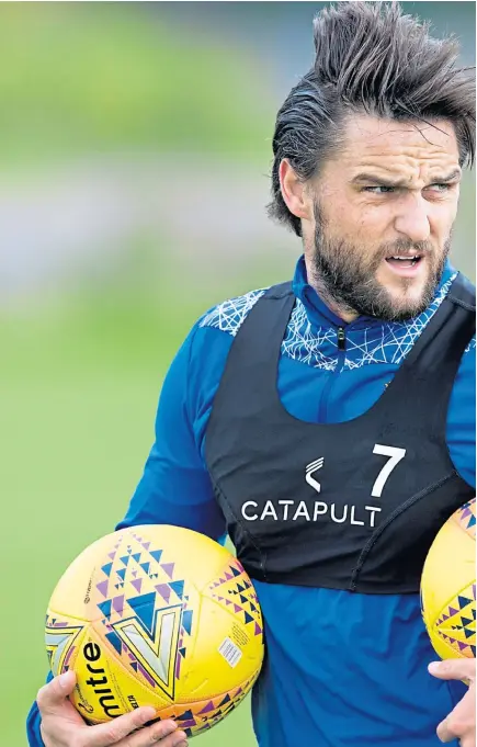  ?? PPA/SNS. ?? Former Dundee United midfielder Craig Conway, above, is poised to sign a one-year deal with Saints, with boss Callum Davidson hoping he proves as influentia­l as Killie veteran Chris Burke, pictured right going up against Callum Booth.