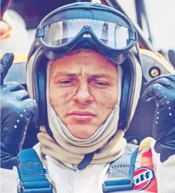  ??  ?? Bruce McLaren buckles up for the ride of his life