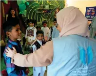  ??  ?? BIG HEART: During a visit to Pakistan, Sheikha Jawaher met some kids in the care of SOS Children’s Villages. — Supplied photo