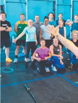  ??  ?? Trainer at CrossFit Abode Elkie Gregory welcomes back the