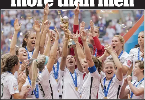  ?? AP ?? Glory girls: the US Women lift the World Cup last year. They bring in £14m more revenue a year than the men’s team