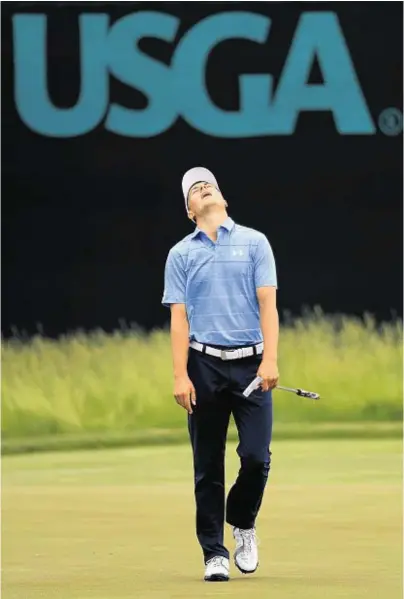  ??  ?? ONE THAT GOT AWAY: Jordan Spieth agonises over a missed putt on the sixth green during the final round