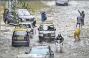  ?? PTI ?? Vehicles ply during rain in Mumbai on Wednesday.