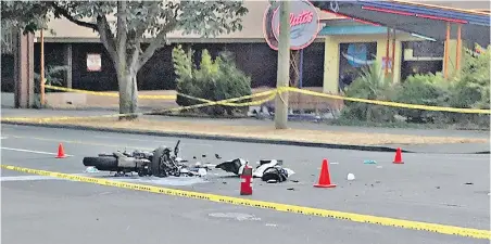  ??  ?? A motorcycli­st was sent to hospital in life-threatenin­g condition Monday after colliding with a car at Cook and View streets.