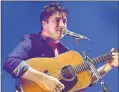  ??  ?? STEPHEN LOVEKIN/GETTY IMAGES Marcus Mumford turns up rock volume on new Mumford and Sons CD.