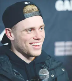  ??  ?? Gus Kenworthy, answering a questionWe­dnesday during a news conference, brought his new boyfriend to Aspen for the X Games. Brent Lewis, The Denver Post