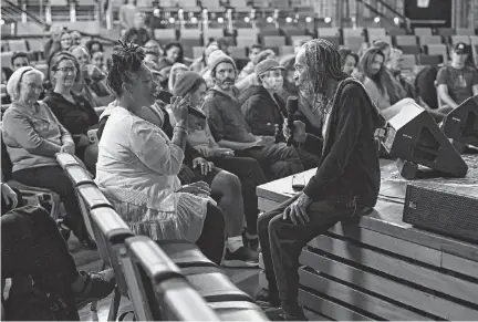  ?? JOSE CARLOS FAJARDO TNS ?? Musician Bobby McFerrin sits onstage as he listens to audience member Corinthia Peoples sing while performing his weekly Circlesong at the Freight and Salvage in Berkeley, California, on Feb. 26.