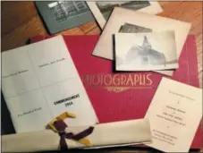  ?? MELISSA RAYWORTH VIA AP ?? This photo shows family memorabili­a and historical photograph­s on a table in Allison Park, Pa. If elderly family members struggle to remember faces in old photo albums, consider scanning those shots and printing them along with brief family stories in...