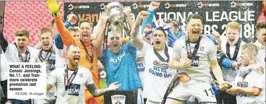  ?? PICTURE: PA Images ?? WHAT A FEELING: Connor Jennings, No.11, and Tranmere celebrate promotion last season